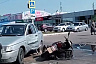 Скутерист протаранил выезжавший с территории ТЦ автомобиль
