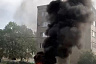Неизвестные подожгли автошины во дворе жилого дома