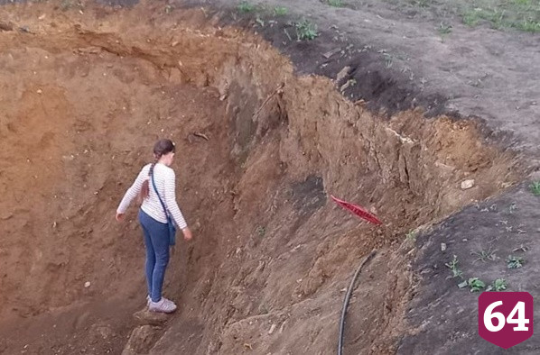 В Саратове засыпали опасный кабель в котловане парка