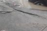 В Саратове BMW провалился в залитую водой яму