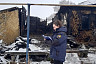 Под завалами сгоревшего дома нашли труп курильщика