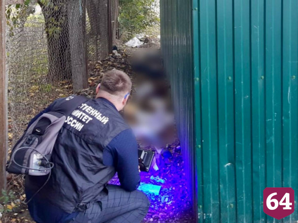За мусорными баками нашли труп мужчины с разбитой головой