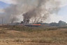 Саратовские пожарные и фермеры отбили от огня жилые дома